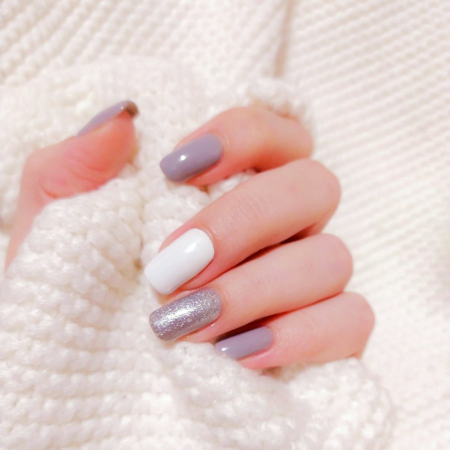 Gel manicure in gray, white and silver